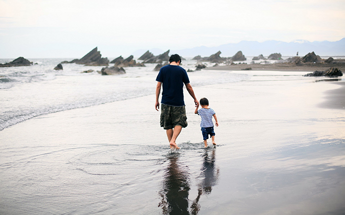 People_Father_and_son_are_walking_on_the_water_060338_