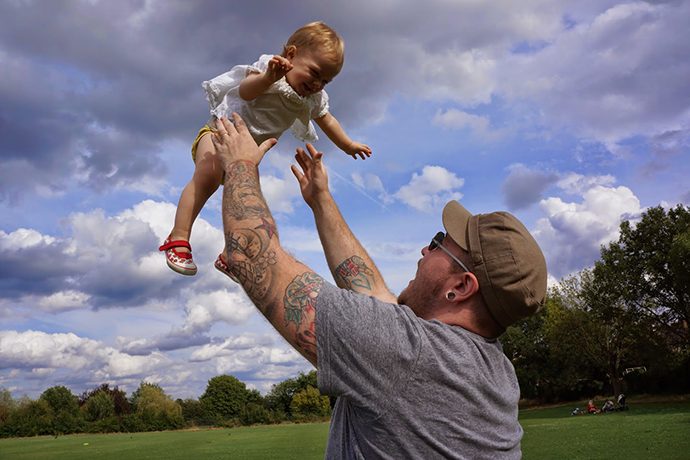 daddy throwing baby in the air