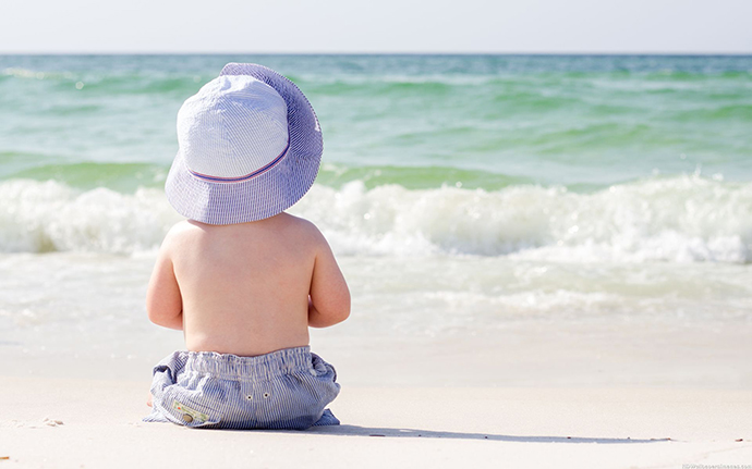 Baby-Boy-Enjoying-At-Beach-Images