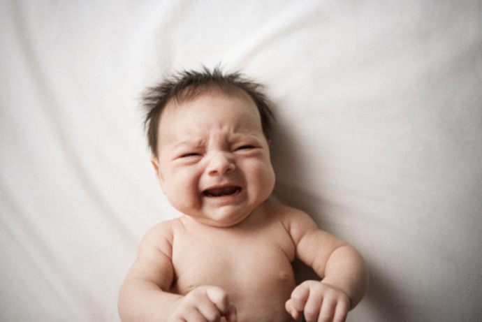 Hispanic newborn baby crying