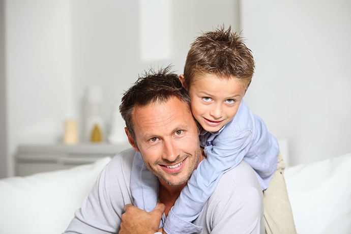 bigstock-Closeup-of-father-and-son-at-h-169929651