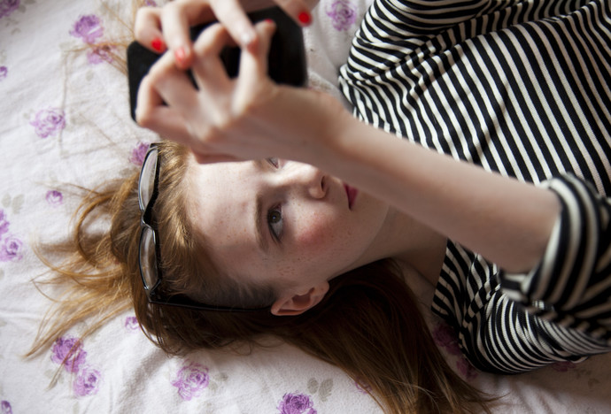 Teen girl texting and connecting